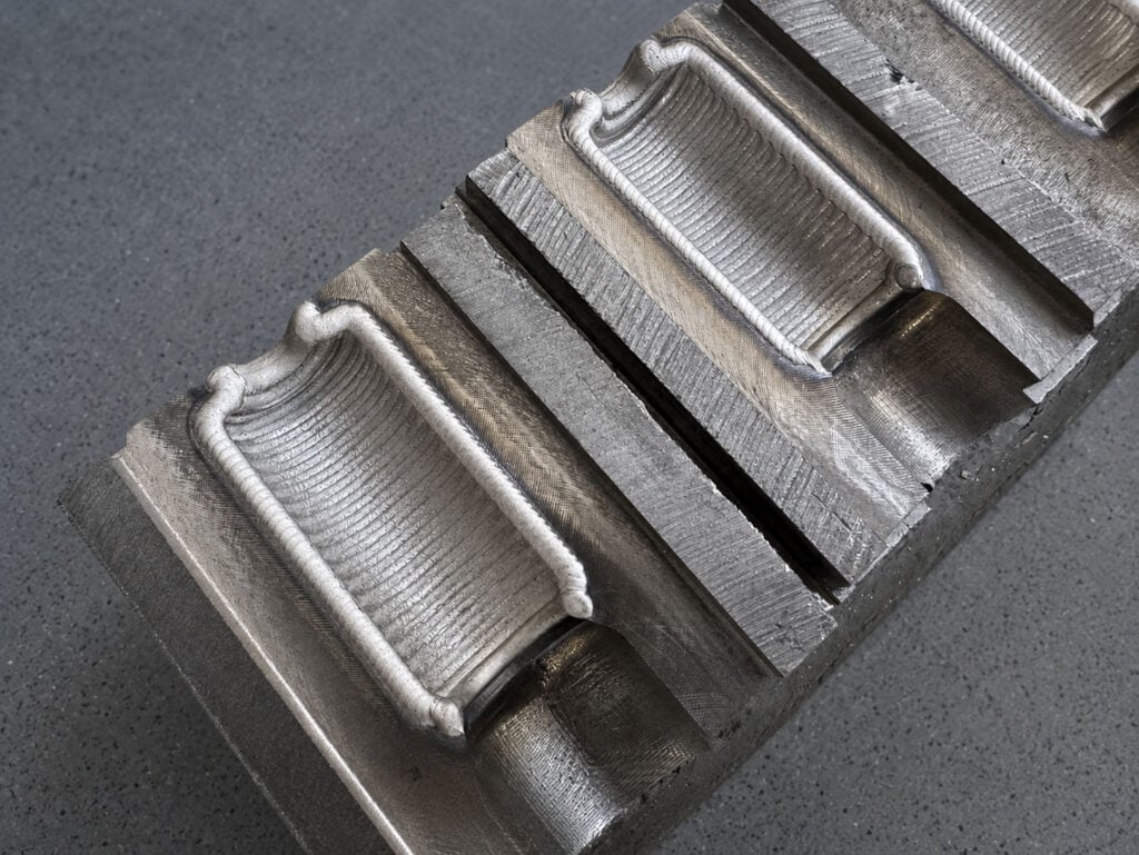 Laser Cladding for Glass Mold Wear Resistance Enhancement
