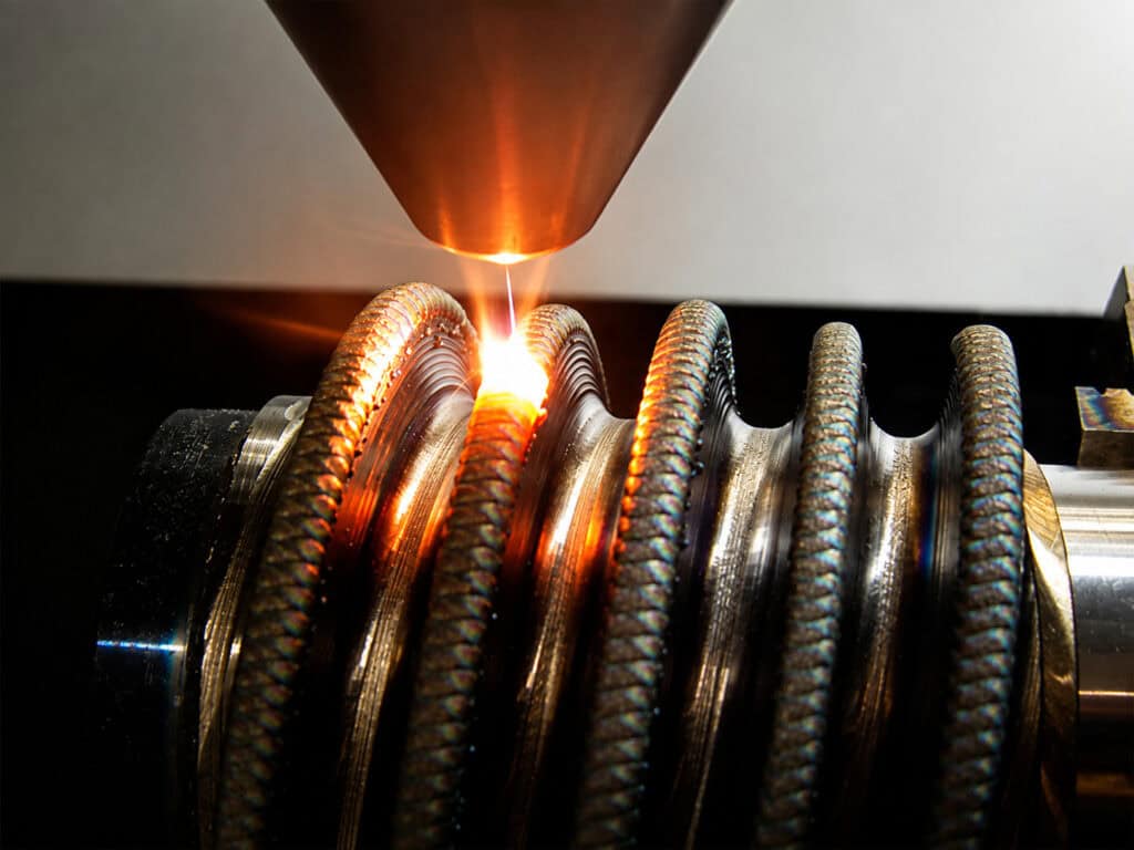 Wear-Resistant Laser Cladding of Screw Flight Edges