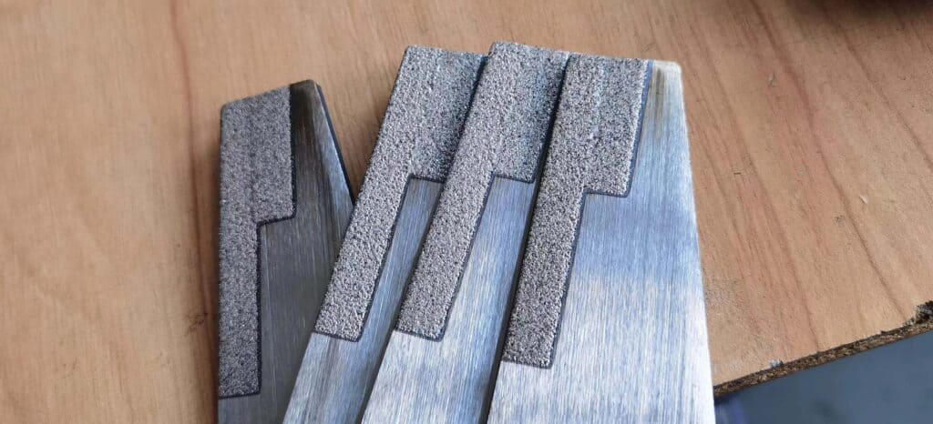 Laser Cladding Restoration and Surface Hardening of Agricultural Machinery Cutting Tools and Blades