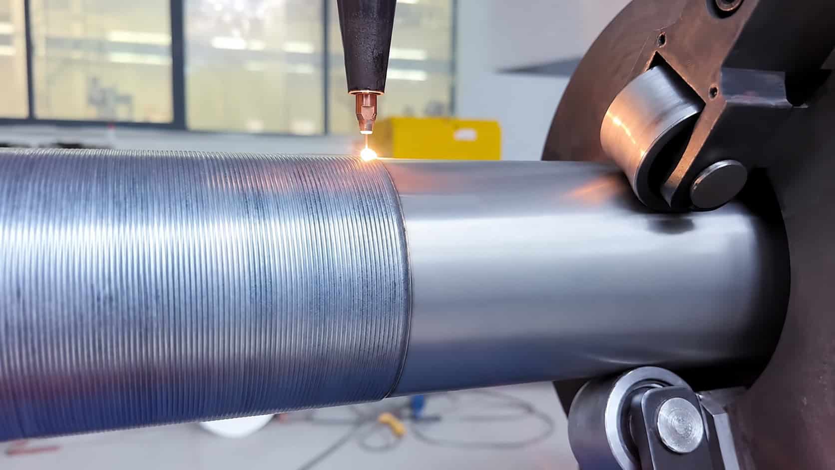Coaxial Wire-Fed Laser Cladding & DED Additive Manufacturing | GREENSTONE